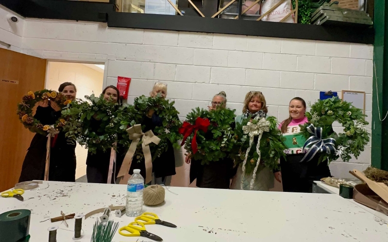 Christmas wreath making workshop at The Grapevine Bar in Romiley, with guests creating fresh foliage wreaths, enjoying mulled wine and mince pies. 3rd December 2025, 6PM. 