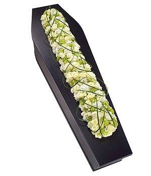 Elegant casket bar with white roses, hydrangea, green viburnum, and lily grass.