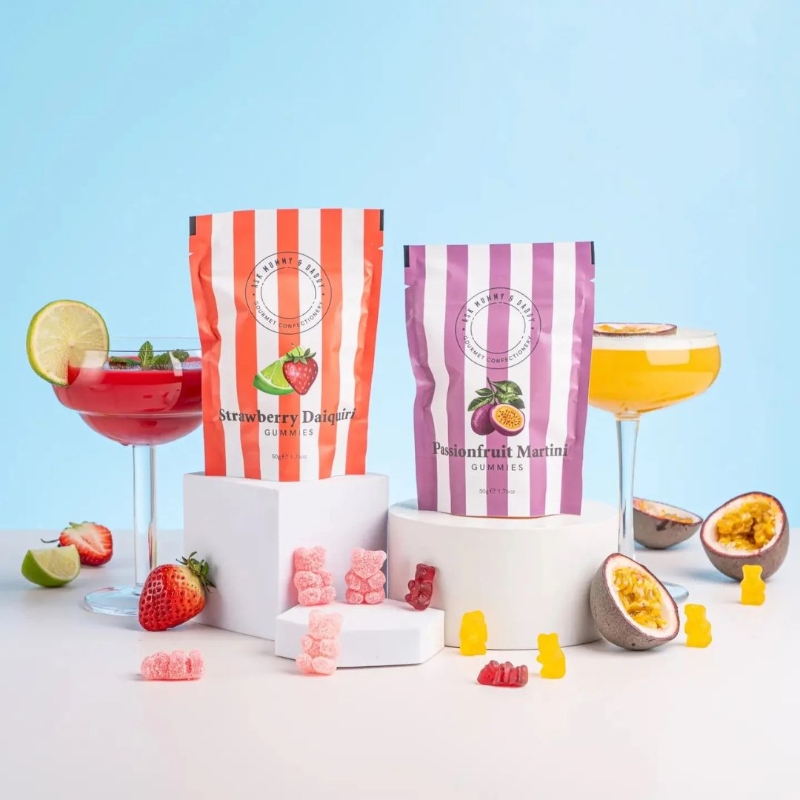 Ask Mummy & Daddy Strawberry Daiquiri palm-oil-free, gluten-free, dairy-free cocktail gummies in a red and white stripe gift pouch.
